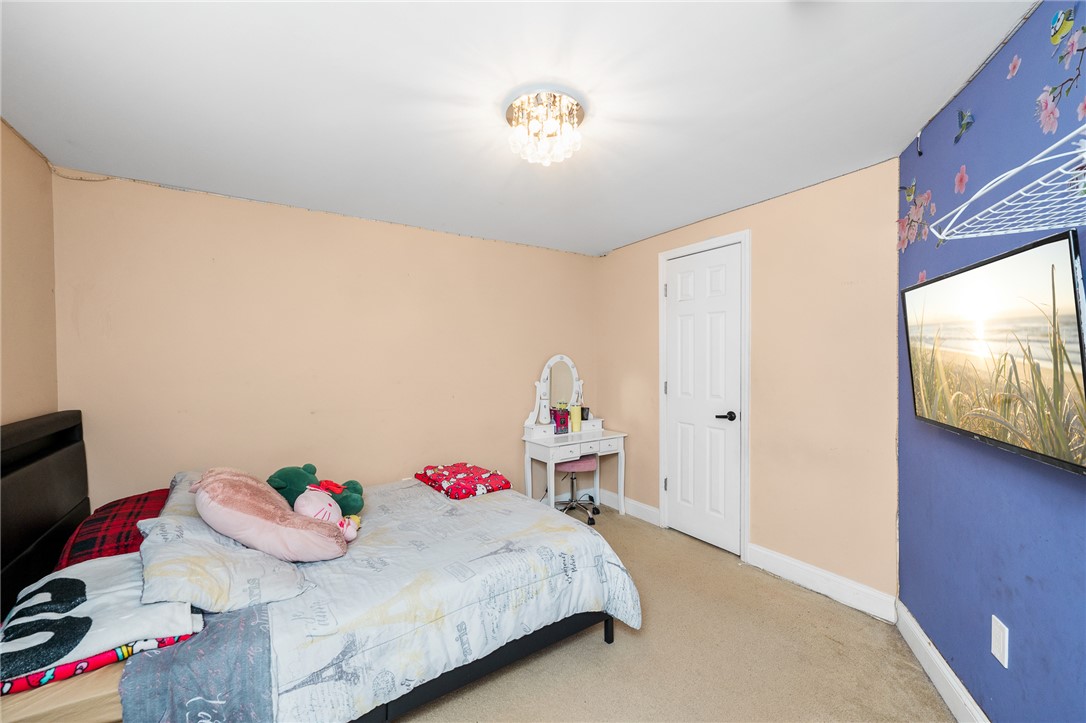 358 Finley Road Easley, SC 29642 - Photo 10 of 20 This cozy bedroom features plush carpeting and ample natural light, creating a comfortable and inviting atmosphere.