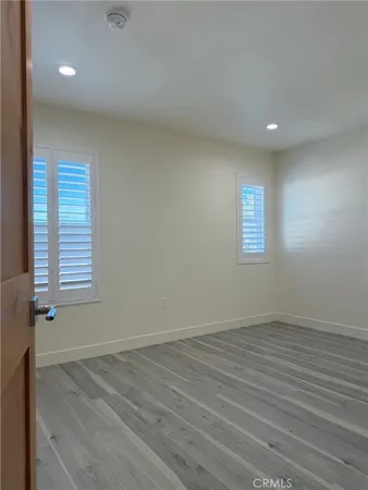a kitchen with a sink stove and refrigerator