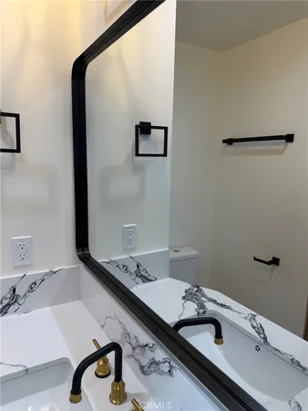 a view of a hallway with washer and dryer