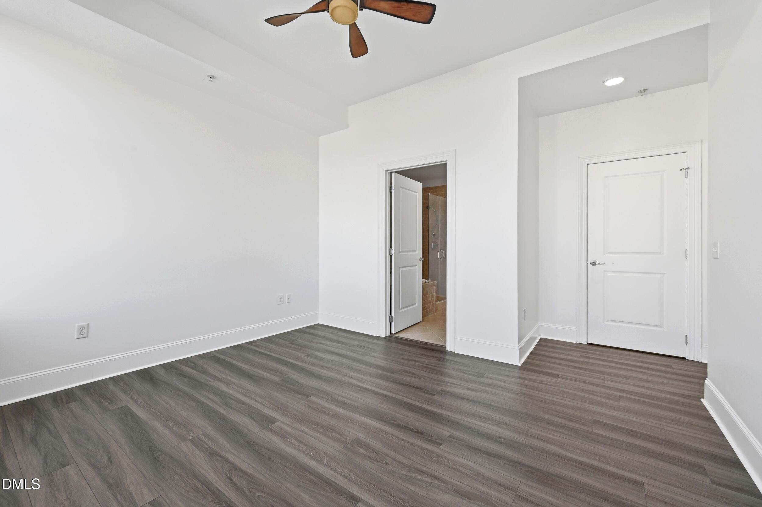 400 West North Street, Unit 810 Raleigh, NC 27603 - Photo 18 of 39 Primary bedroom/bath entrance