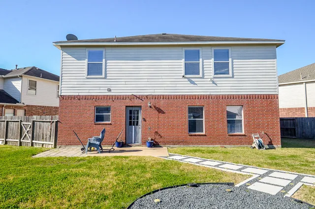 a front view of house with yard