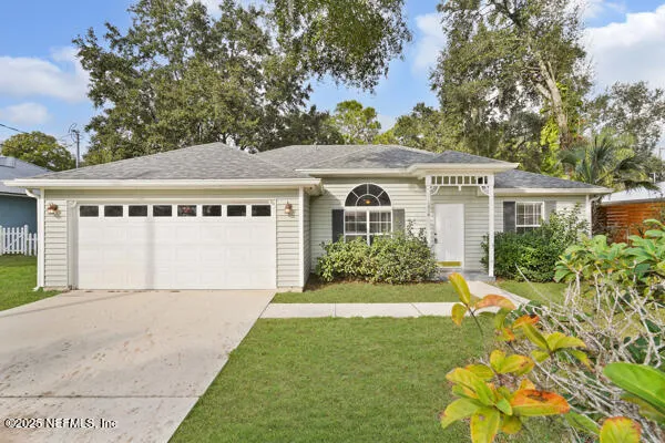 front view of a house with a yard