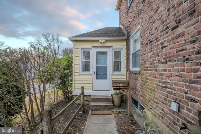 a front view of a house with yard