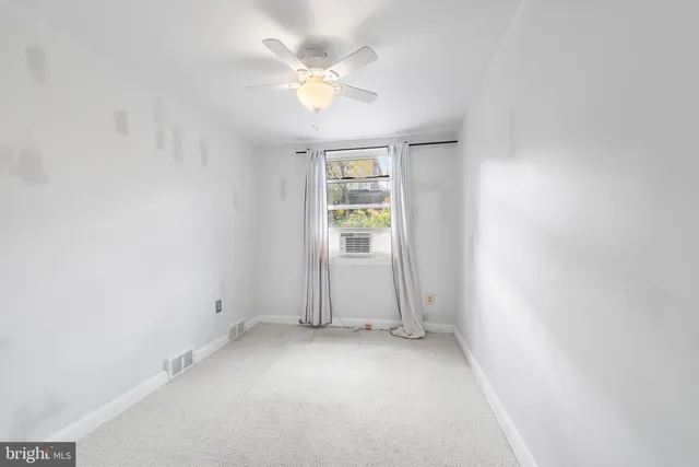 an empty room with a window