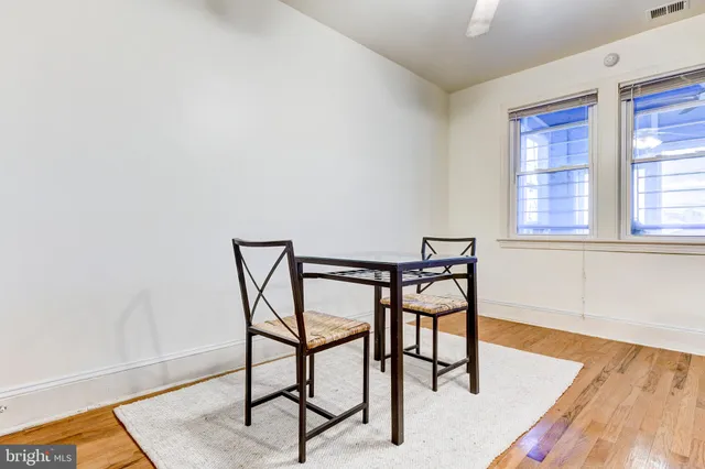 a view of a livingroom with furniture and wooden floor