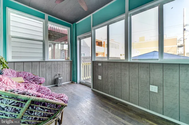 a view of a porch with a potted plant