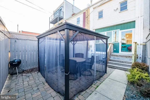 a view of a house with a small porch