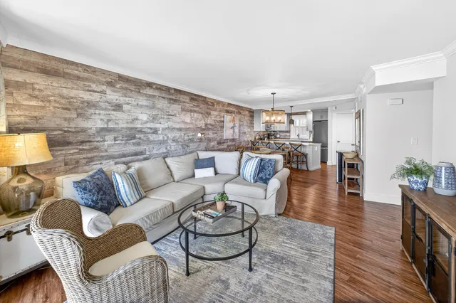 a spacious bedroom with a bed and a table