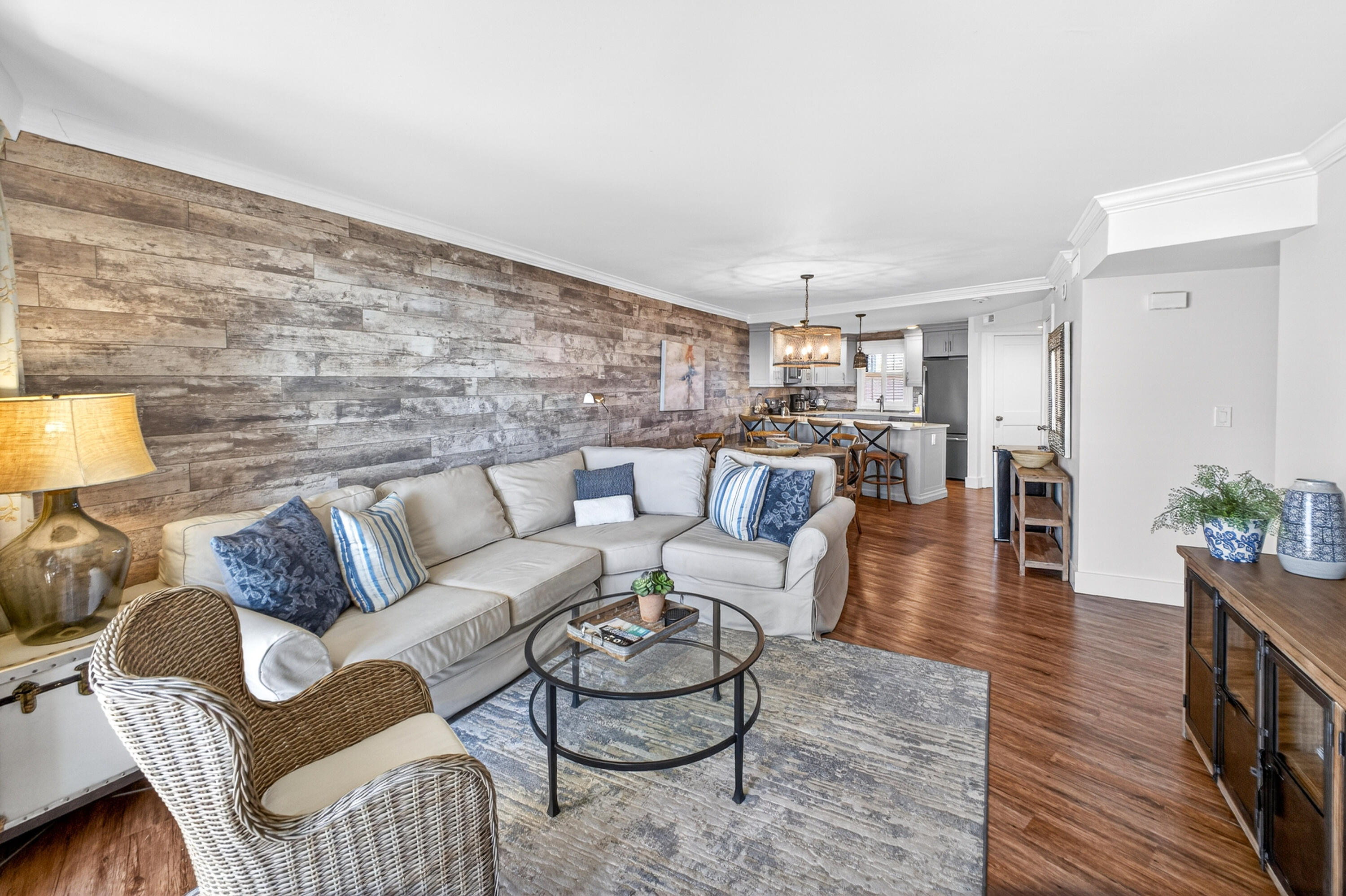 4024 Beachside 1, Unit 4024 Miramar Beach, FL 32550 - Photo 15 of 56 a living room with furniture and wooden floor