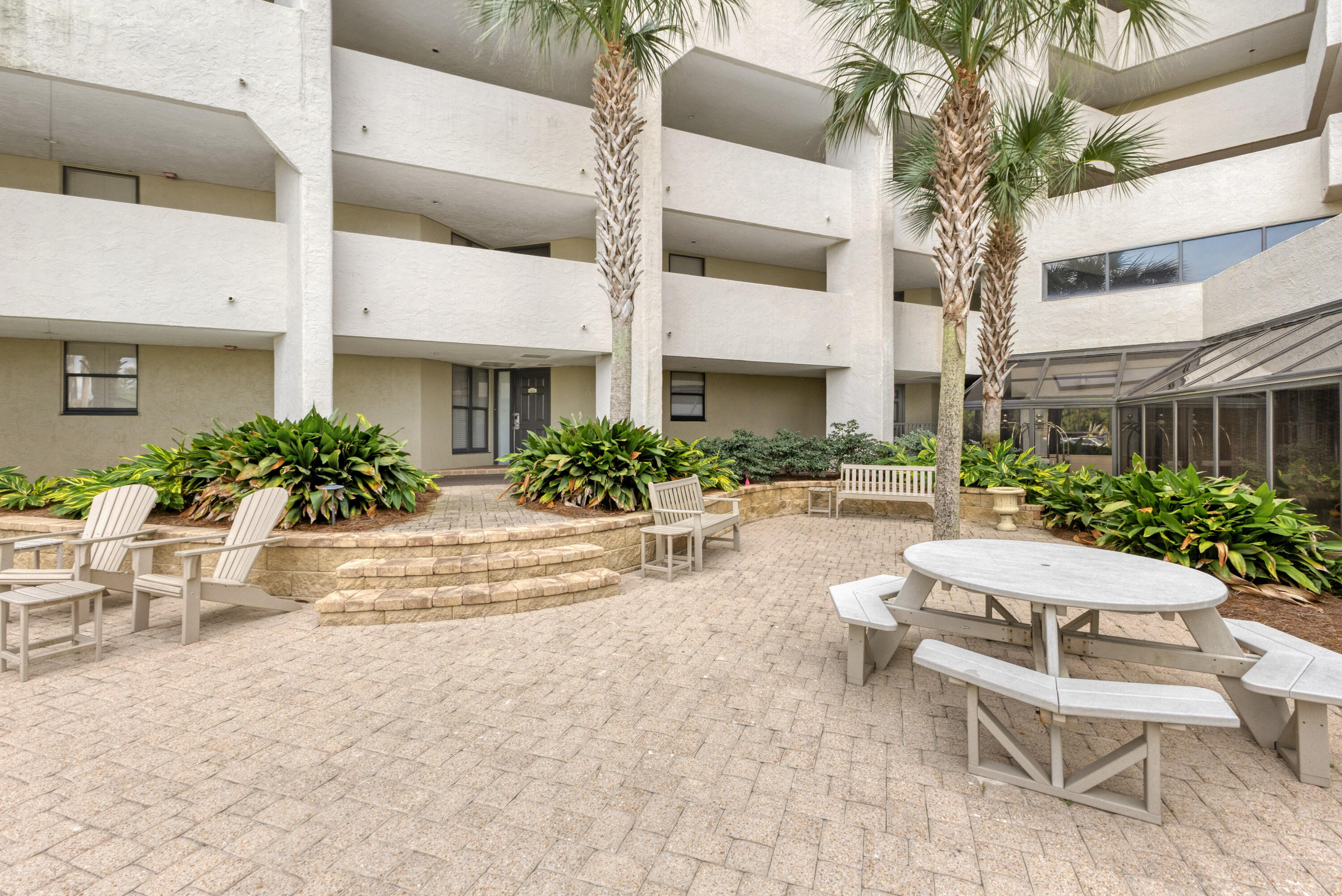4024 Beachside 1, Unit 4024 Miramar Beach, FL 32550 - Photo 36 of 56 a view of a building with sitting area