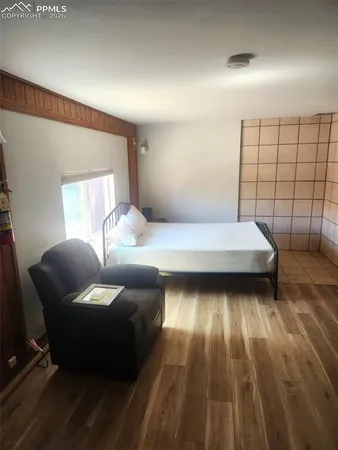 a room with a sink and a mirror