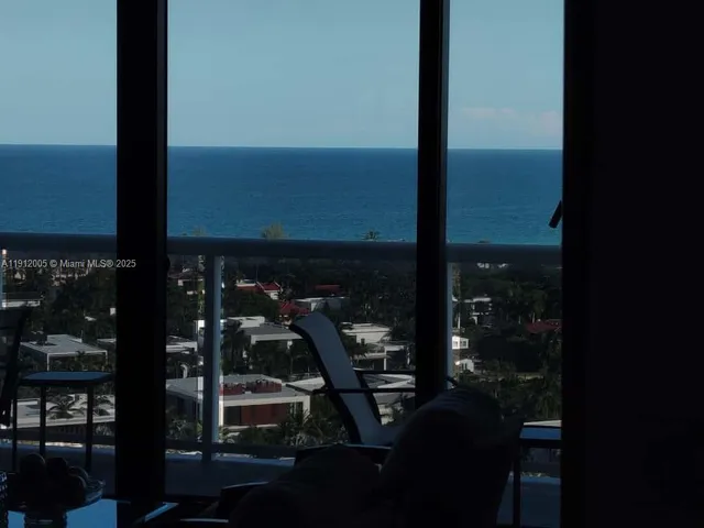 a view of a building with a street