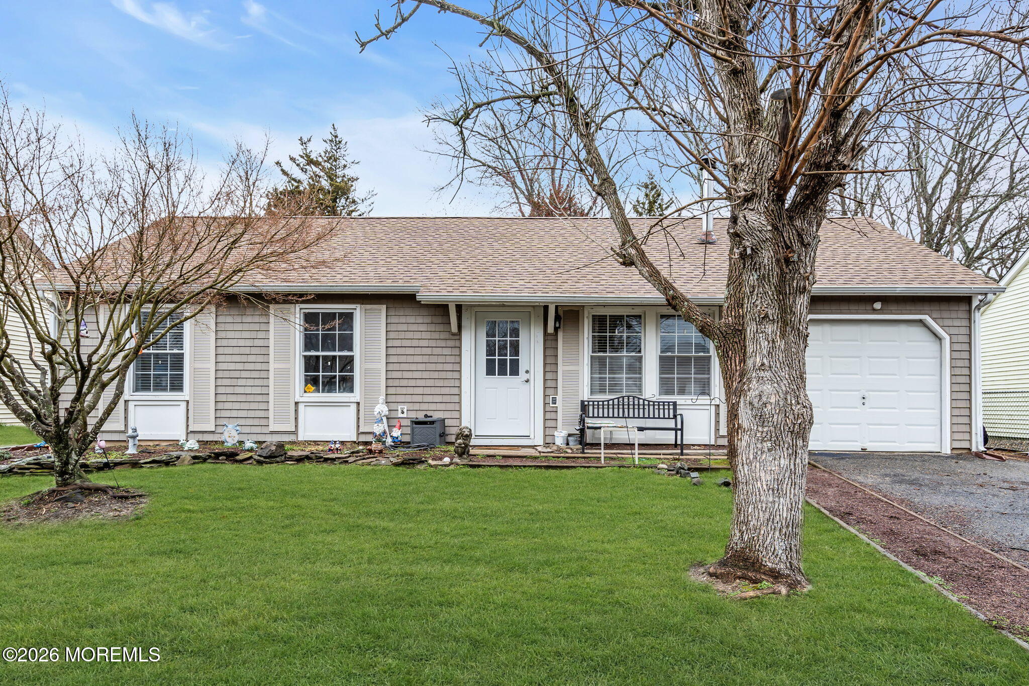 4 Mast Drive Barnegat, NJ 08005 - Photo 1 of 15 a front view of house with a garden and trees