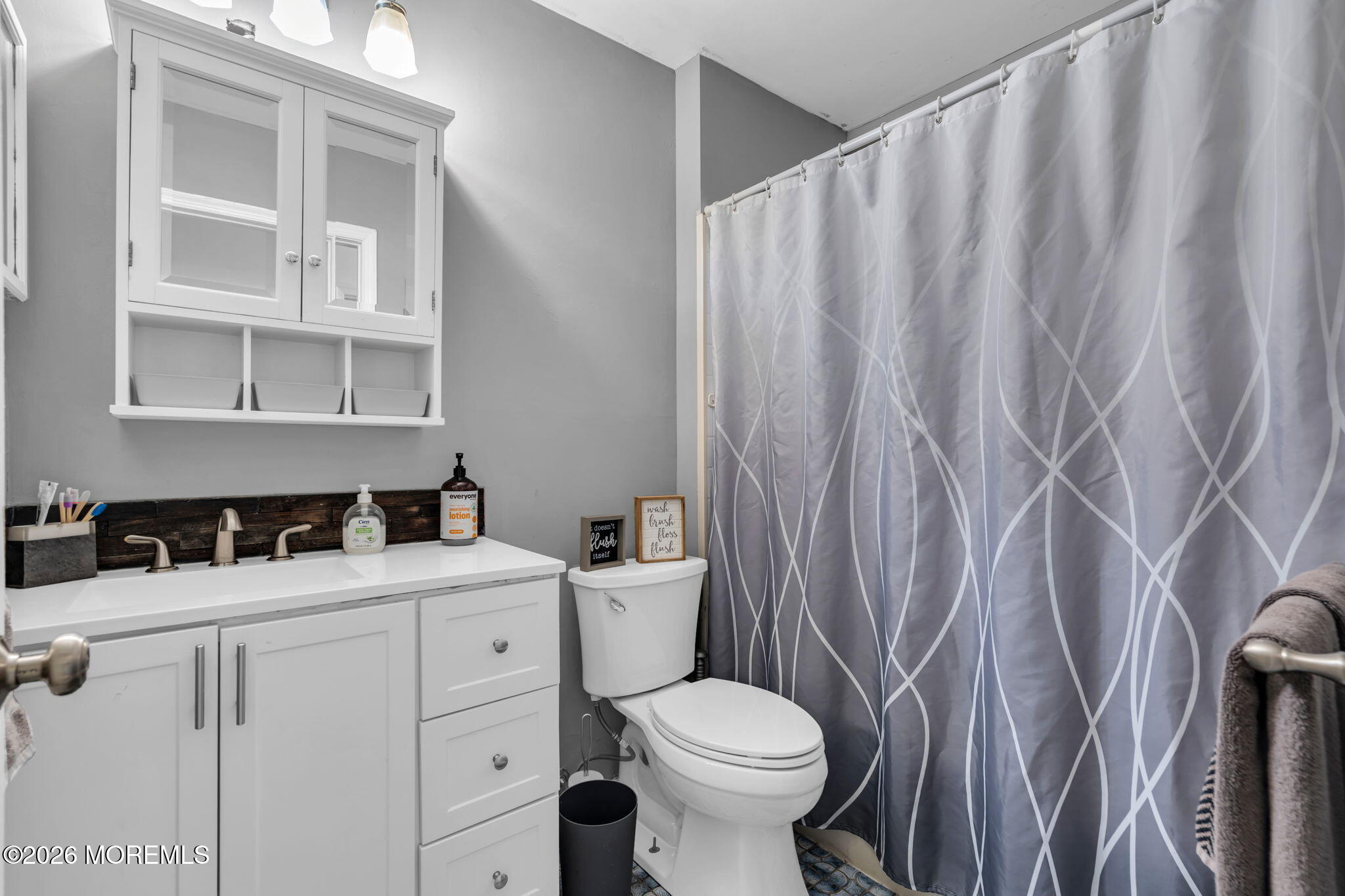 4 Mast Drive Barnegat, NJ 08005 - Photo 9 of 15 a bathroom with a sink a toilet and shower