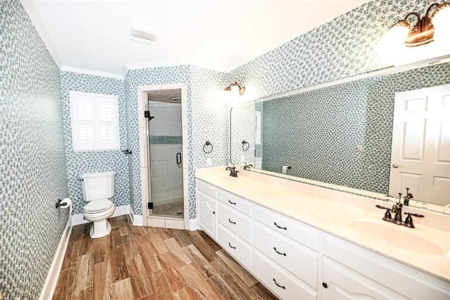a spacious bathroom with a bathtub and a sink