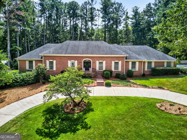 a house view with a garden space