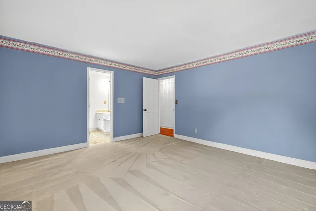 a bathroom with a sink a toilet and a shower