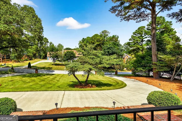 a view of swimming pool with a yard