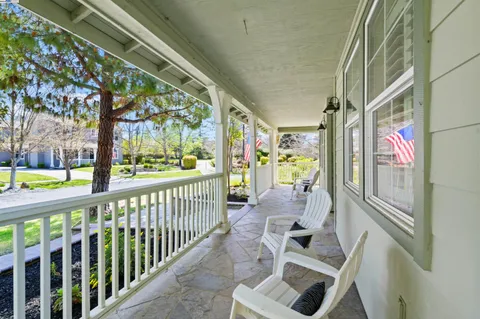 a view of porch with furniture