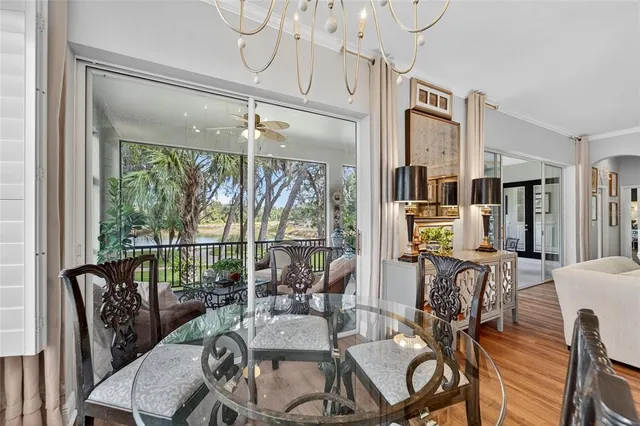 a bathroom with a granite countertop double vanity sink and a mirror