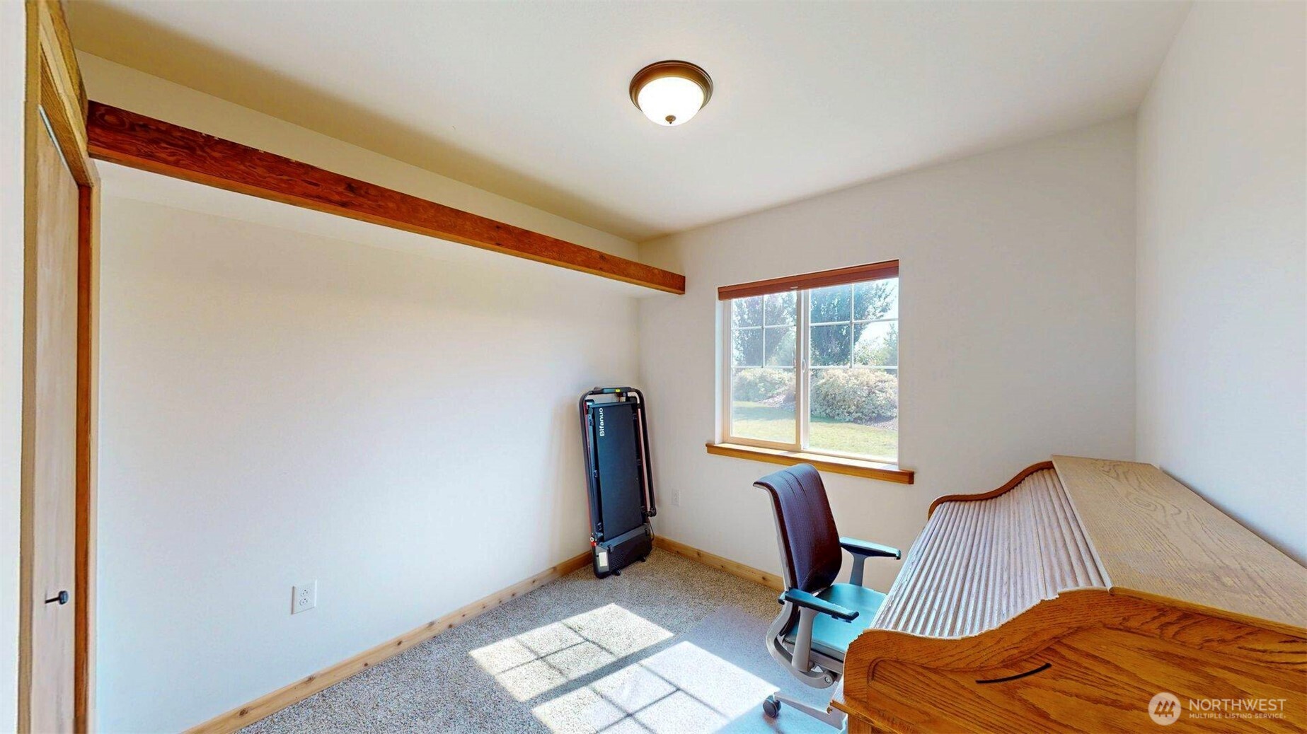 71 Shumway Road Omak, WA 98841 - Photo 26 of 40 a bedroom with furniture and a window