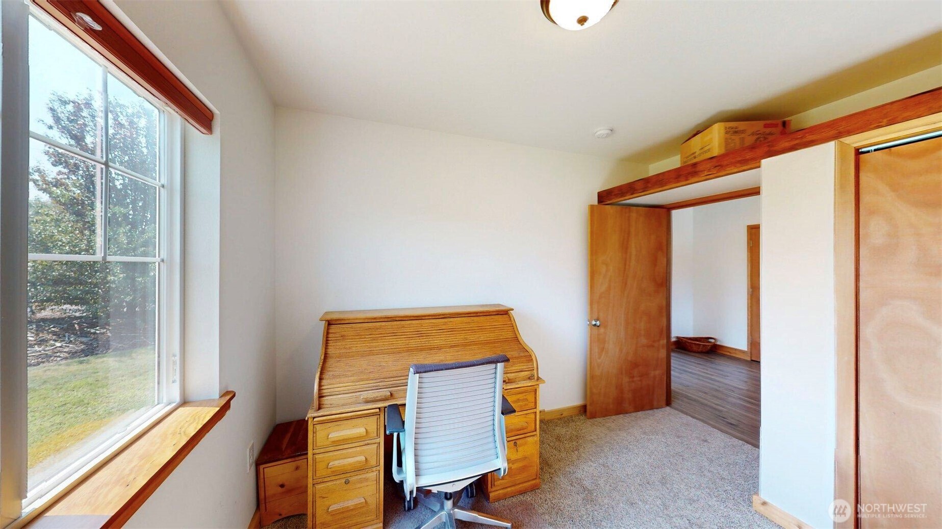 71 Shumway Road Omak, WA 98841 - Photo 27 of 40 a view of room with window and hallway