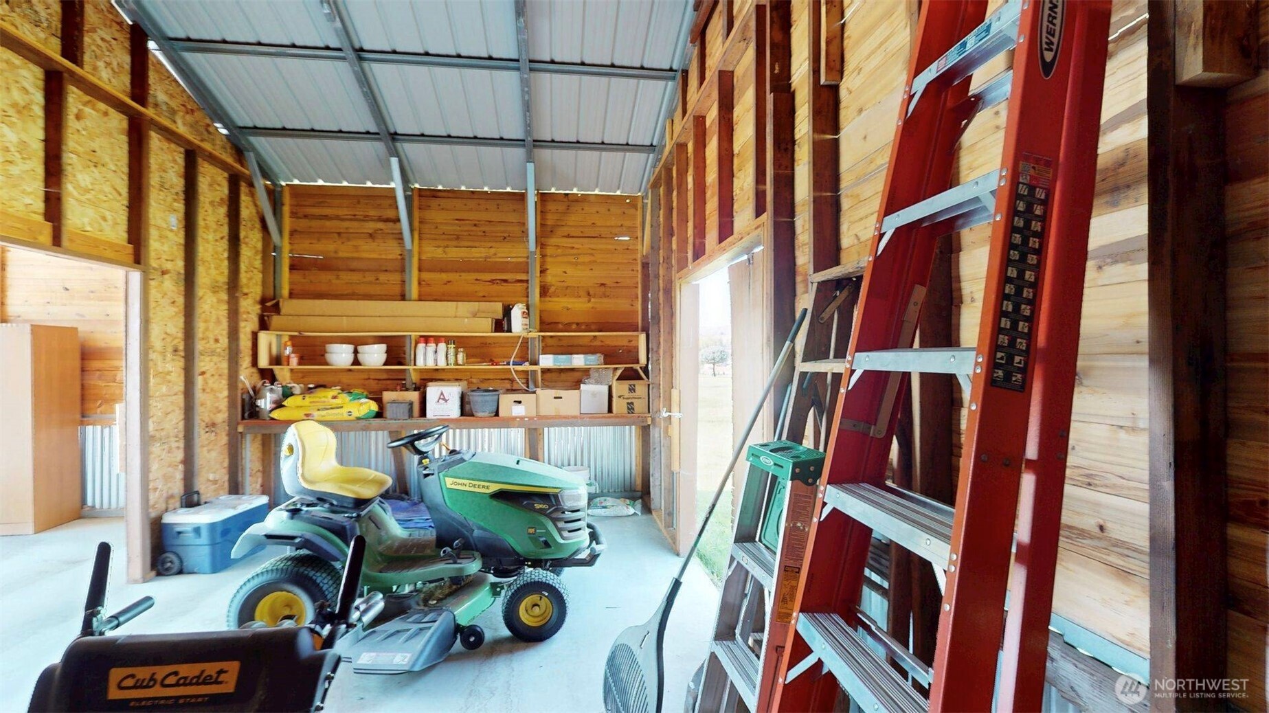 71 Shumway Road Omak, WA 98841 - Photo 33 of 40 a view of walk in closet with clothes and shoes