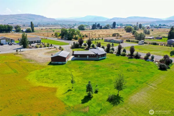 a view of a house with a big yard