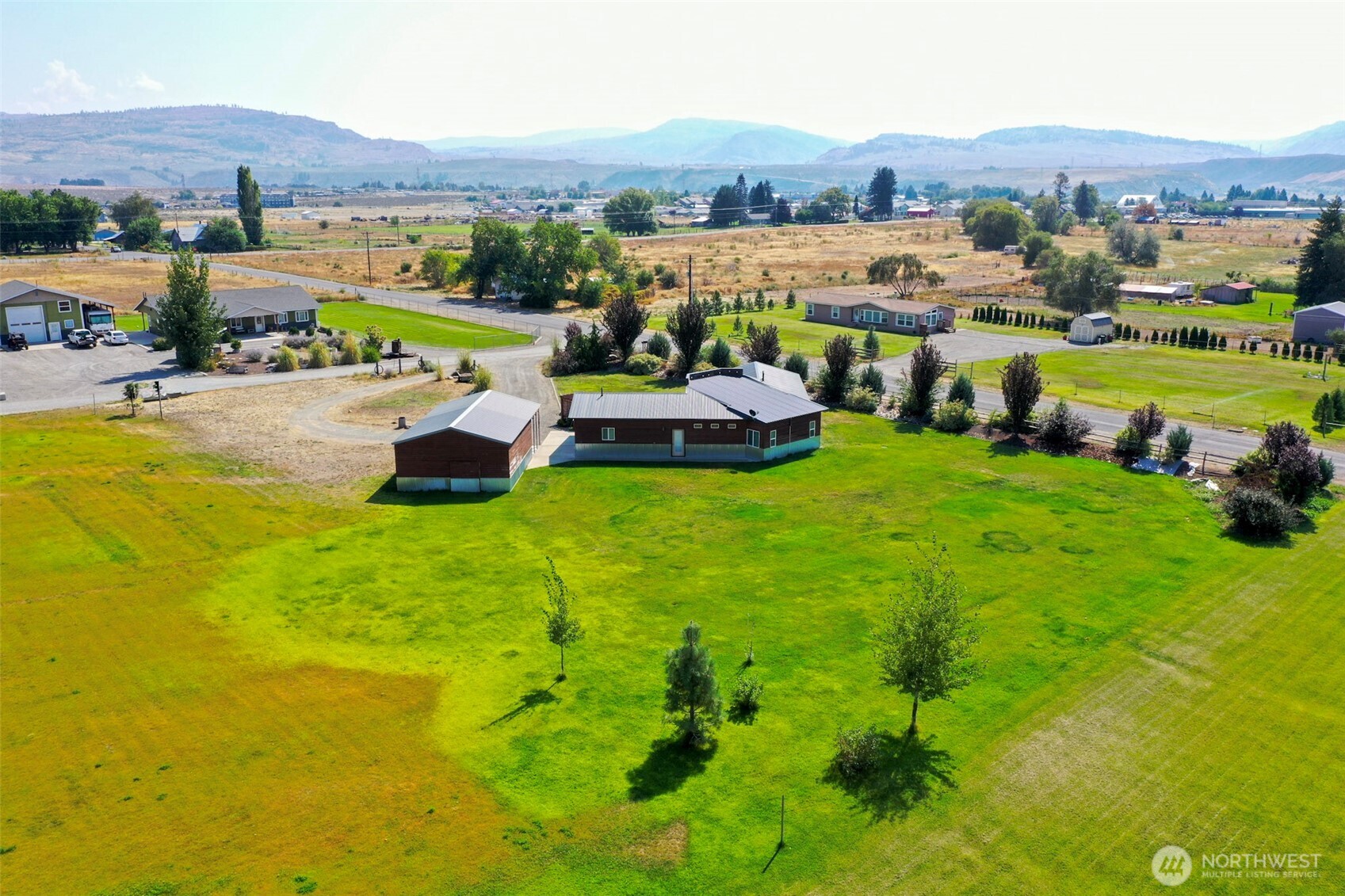 71 Shumway Road Omak, WA 98841 - Photo 38 of 40 a view of a house with a big yard