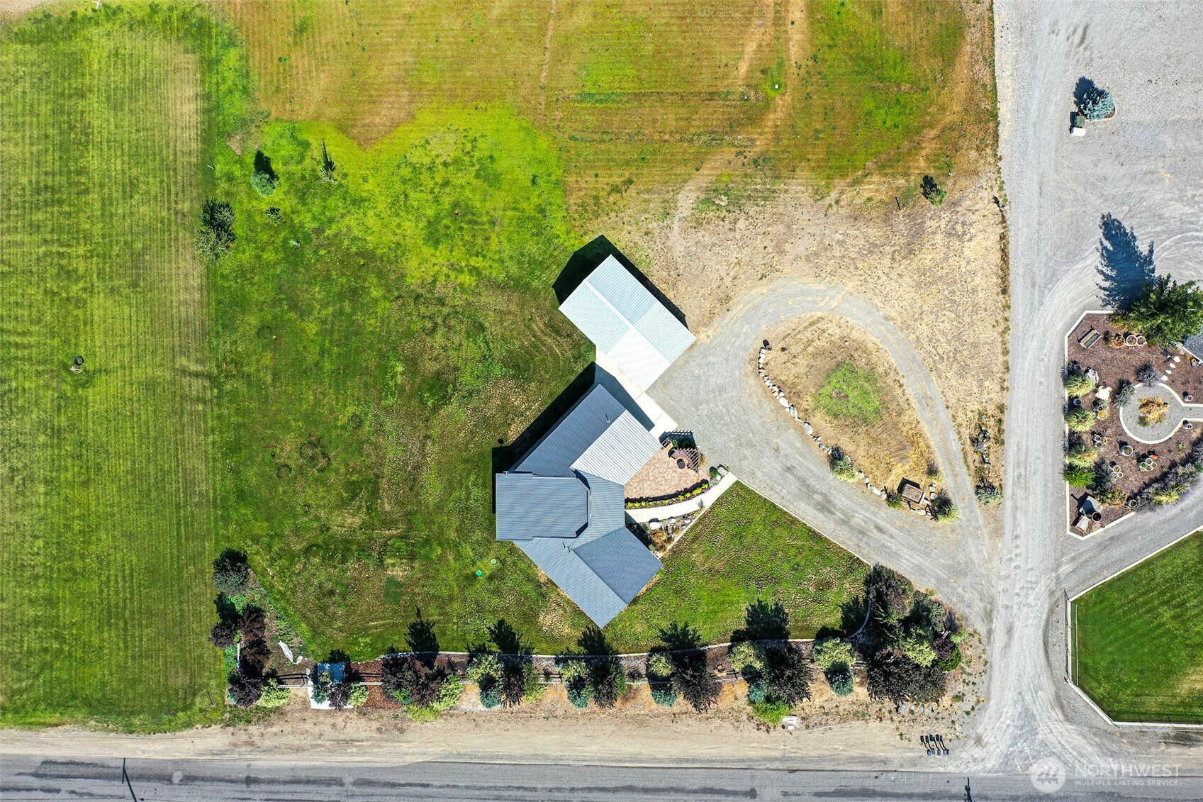 71 Shumway Road Omak, WA 98841 - Photo 39 of 40 a view of entryway with a house and a street view