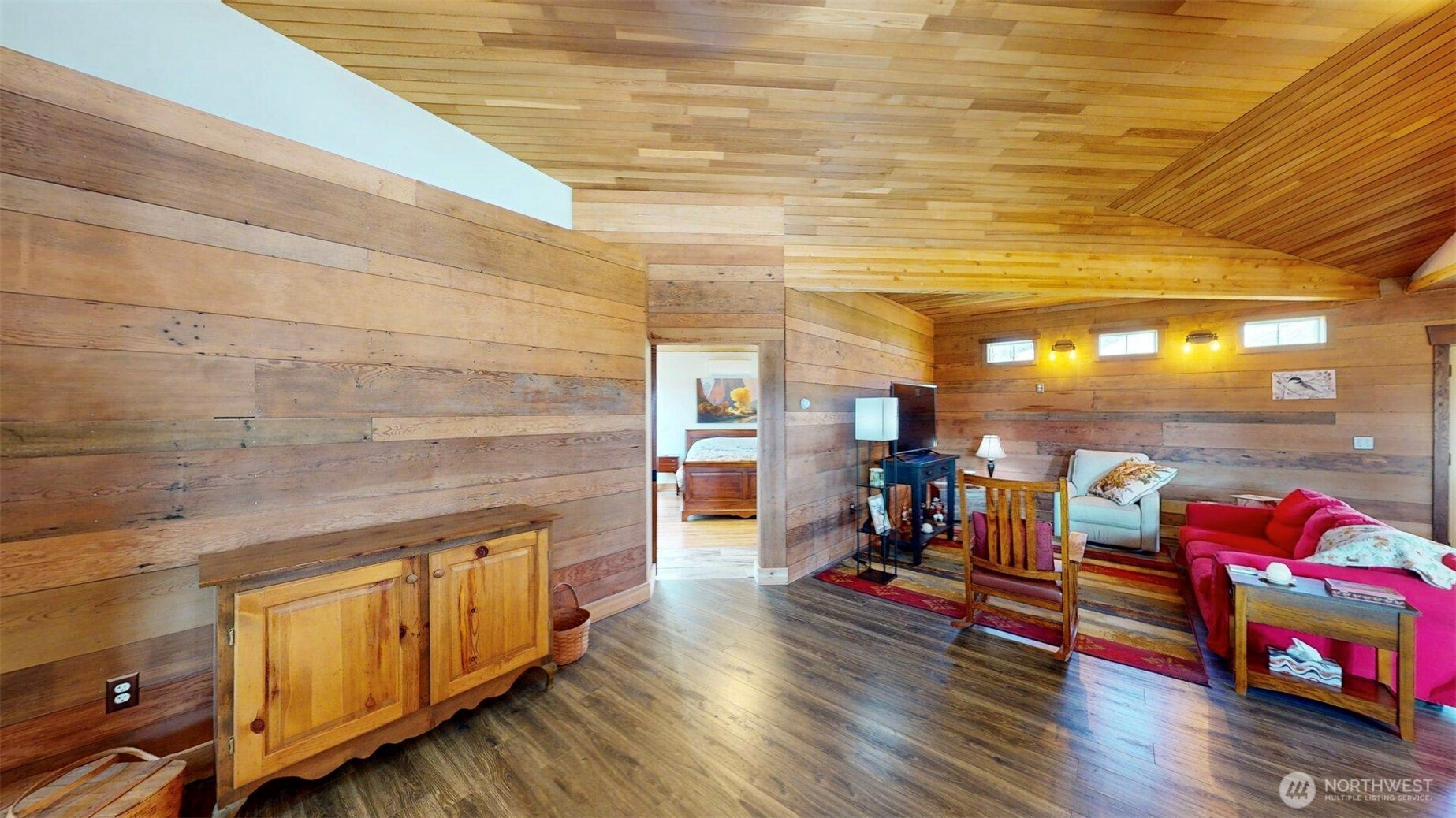 71 Shumway Road Omak, WA 98841 - Photo 4 of 40 a living room with baby crib furniture and a fireplace