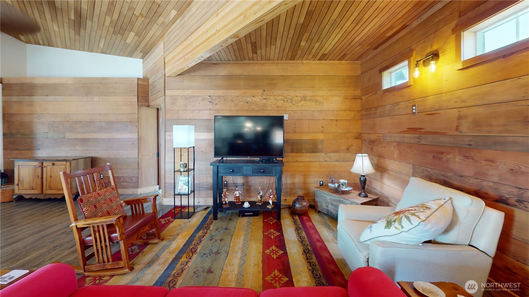 71 Shumway Road Omak, WA 98841 - Photo 5 of 40 a living room with furniture and a flat screen tv
