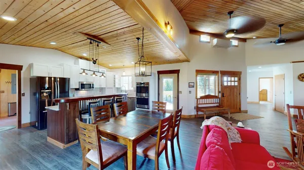 a view of a dining room with furniture