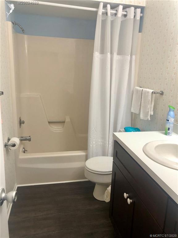 1225 Northwest 21st Street, Unit 2908 Stuart, FL 34994 - Photo 26 of 56 a bathroom with a sink toilet and shower