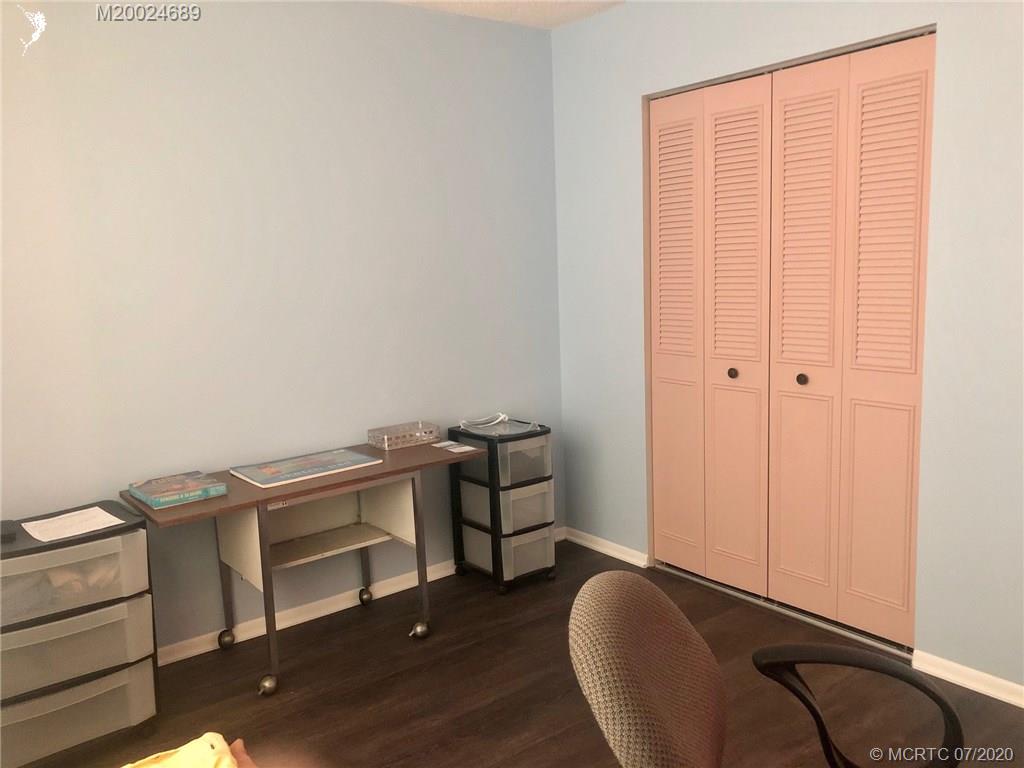 1225 Northwest 21st Street, Unit 2908 Stuart, FL 34994 - Photo 29 of 56 a room with storage and utility