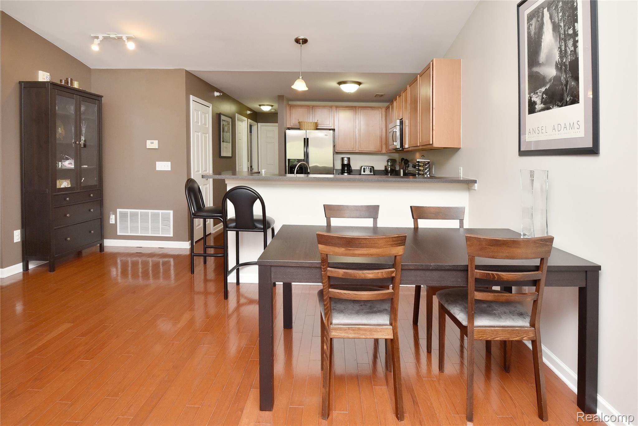 3296 Hilton Road, Unit 104 Ferndale, MI 48220 - Photo 8 of 19 DINING AREA PLUS (CABINET IN NOOK AREA)