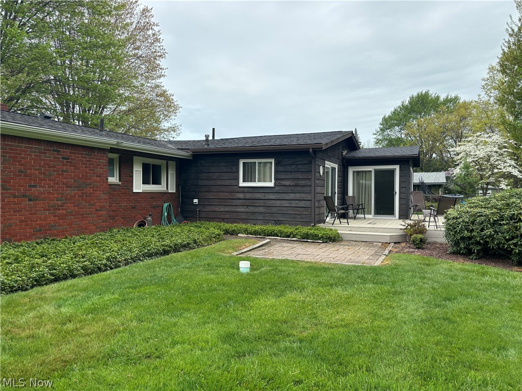 5595 Meister Road Mentor, OH 44060 - Photo 24 of 26 Back of house with a lawn and a patio area