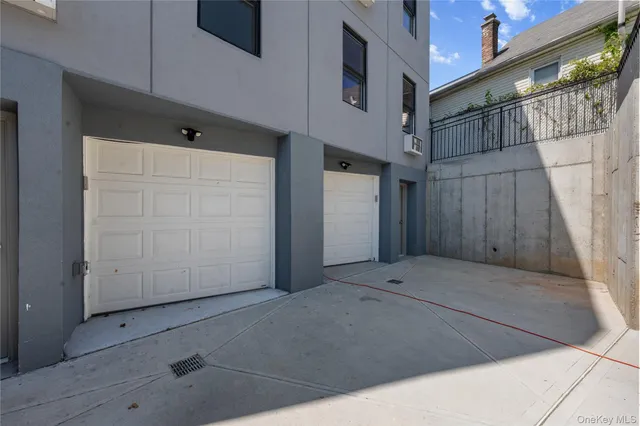 a view of parking space in front of house