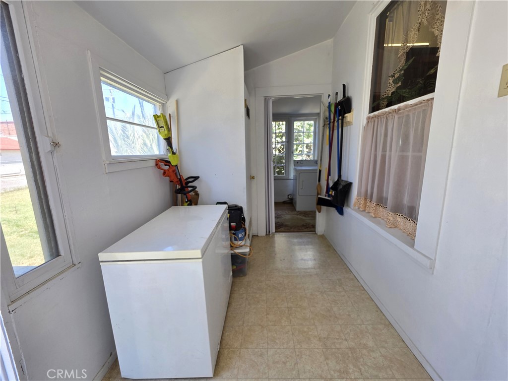 1414 Marin Street Corning, CA 96021 - Photo 27 of 43 a view of hallway with washer and dryer