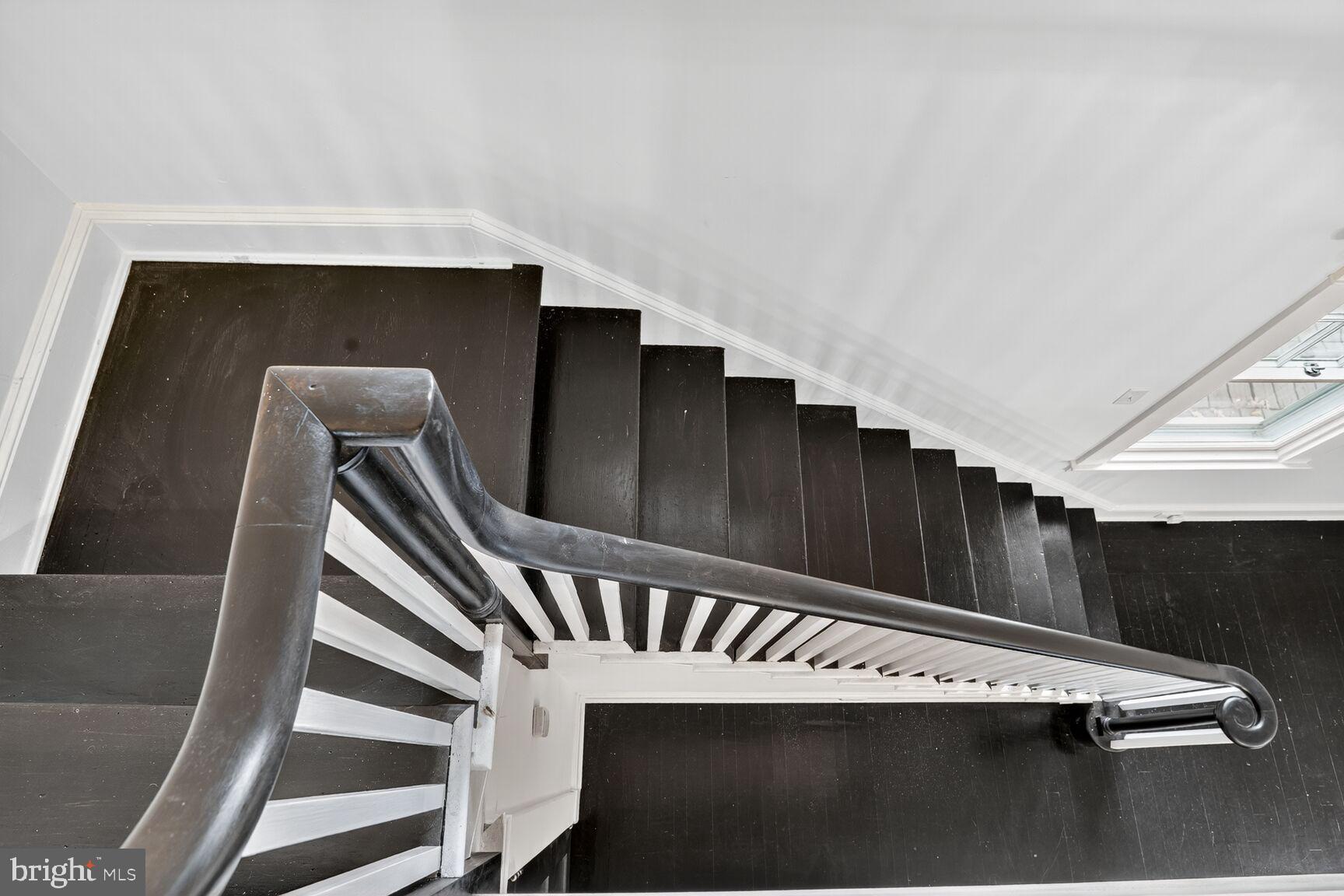 719 Brinkwood Road Baltimore, MD 21229 - Photo 14 of 31 a view of a hallway with staircase