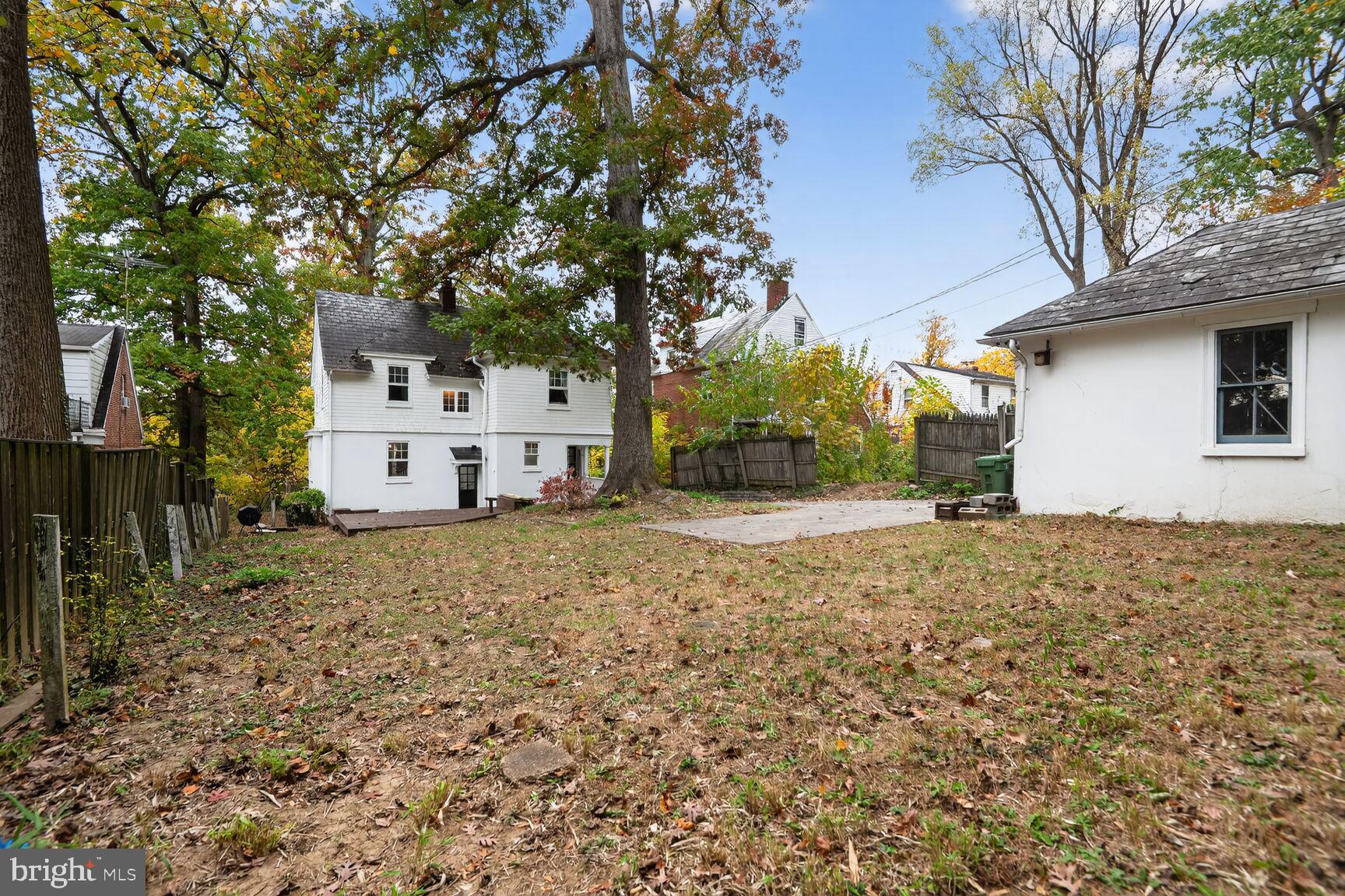 719 Brinkwood Road Baltimore, MD 21229 - Photo 28 of 31 a white house that has a tree in front of it