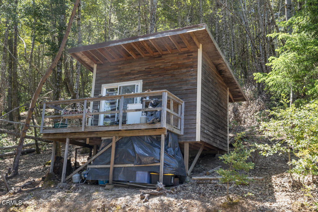 4350 Cahto Peak Road Laytonville, CA 95417 - Photo 4 of 7 a view of house with backyard and deck
