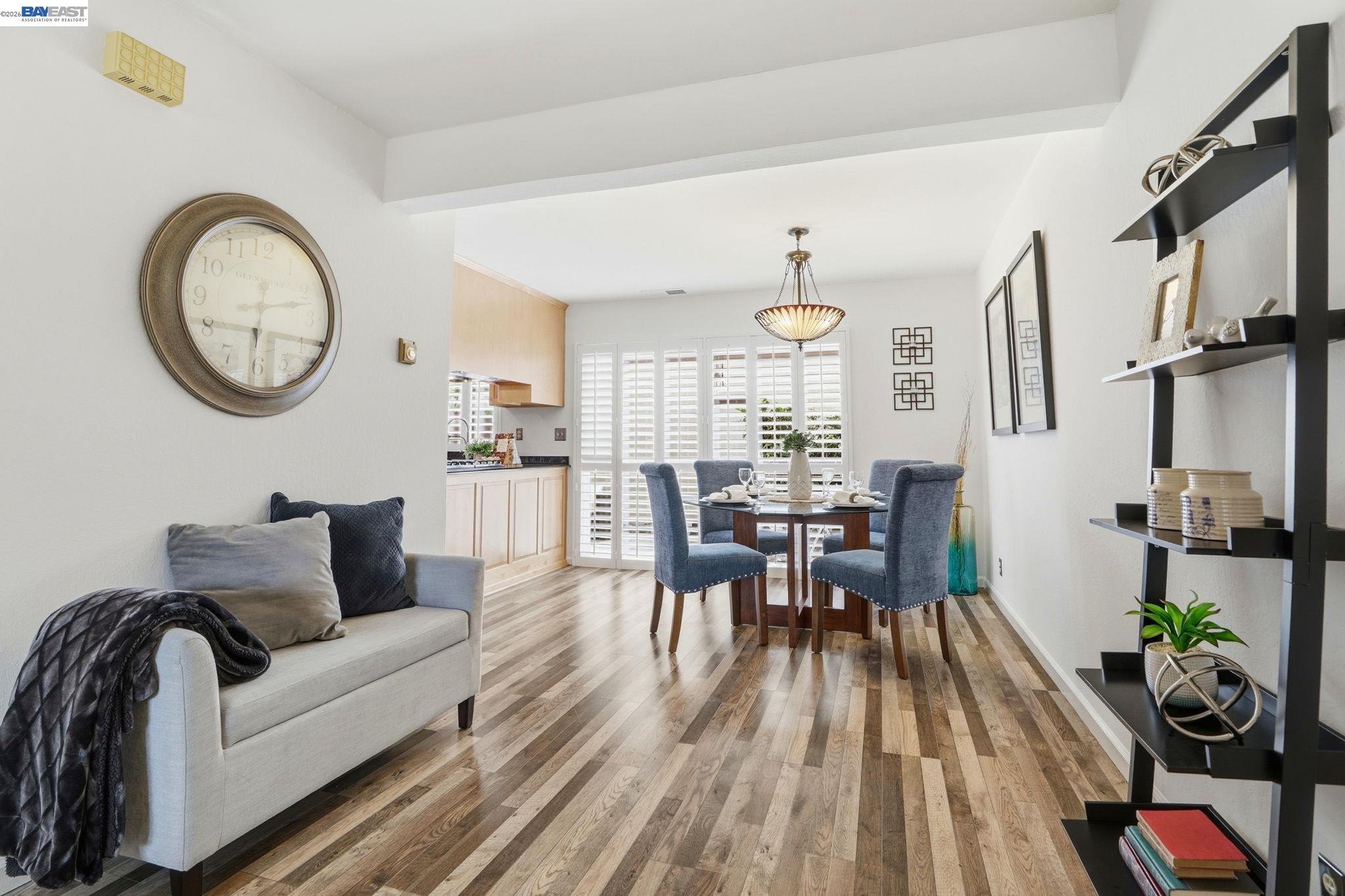 38524 Burdette Common Fremont, CA 94536 - Photo 12 of 35 a living room with patio bathtub and wooden floor