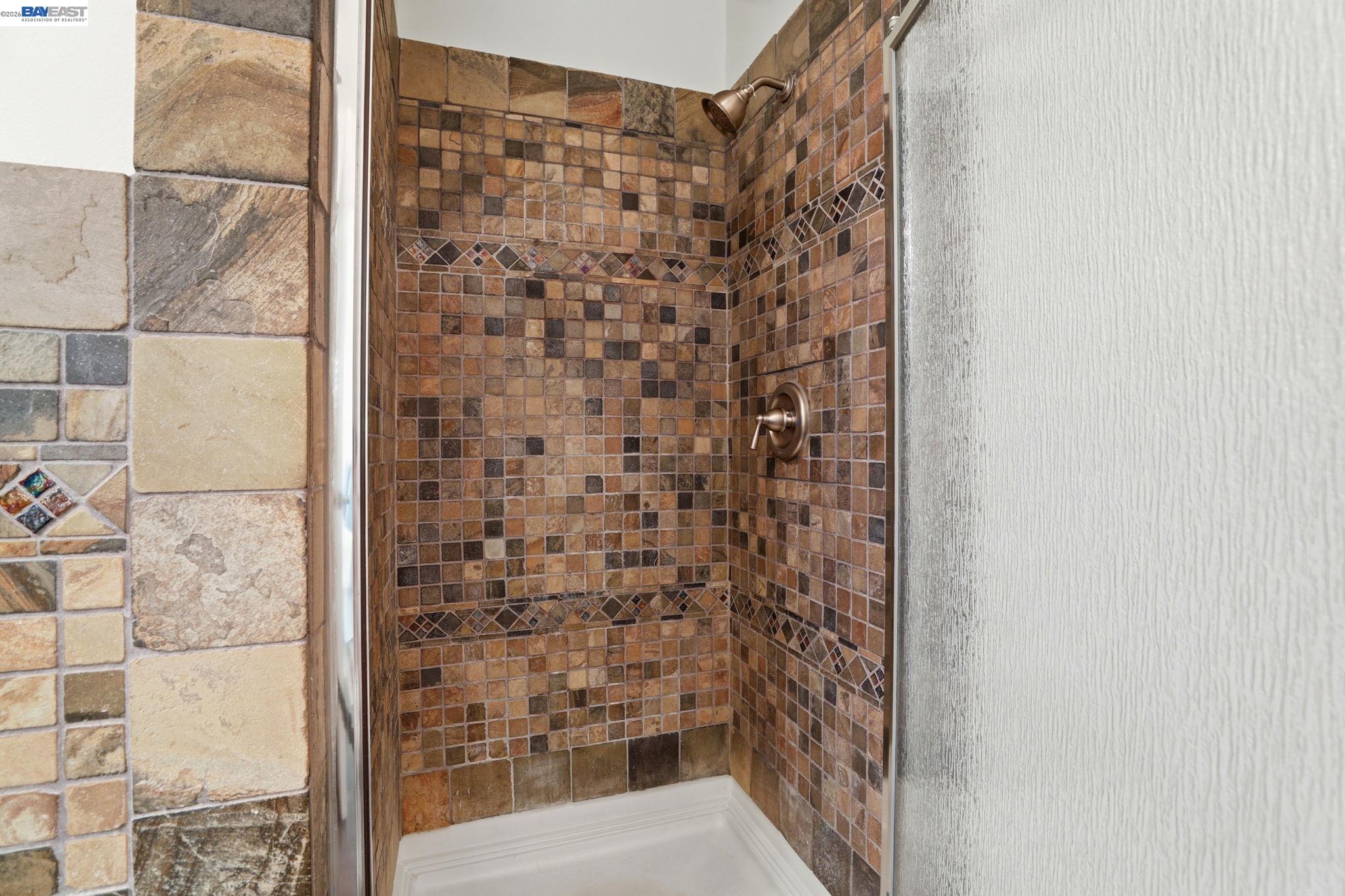 38524 Burdette Common Fremont, CA 94536 - Photo 24 of 35 a bathroom with a shower
