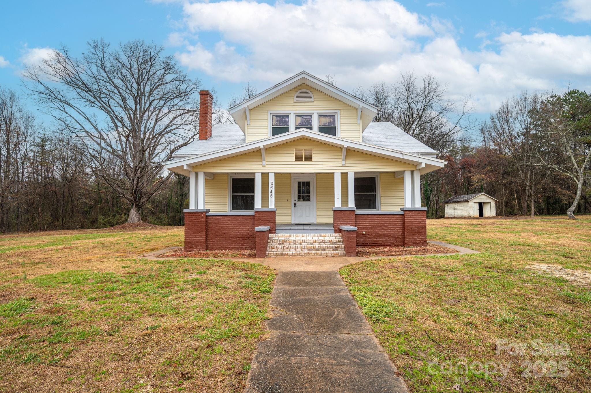 2645 Kool Park Road Northeast Hickory, NC 28601 - Photo 1 of 46 a front view of a house with yard and green space