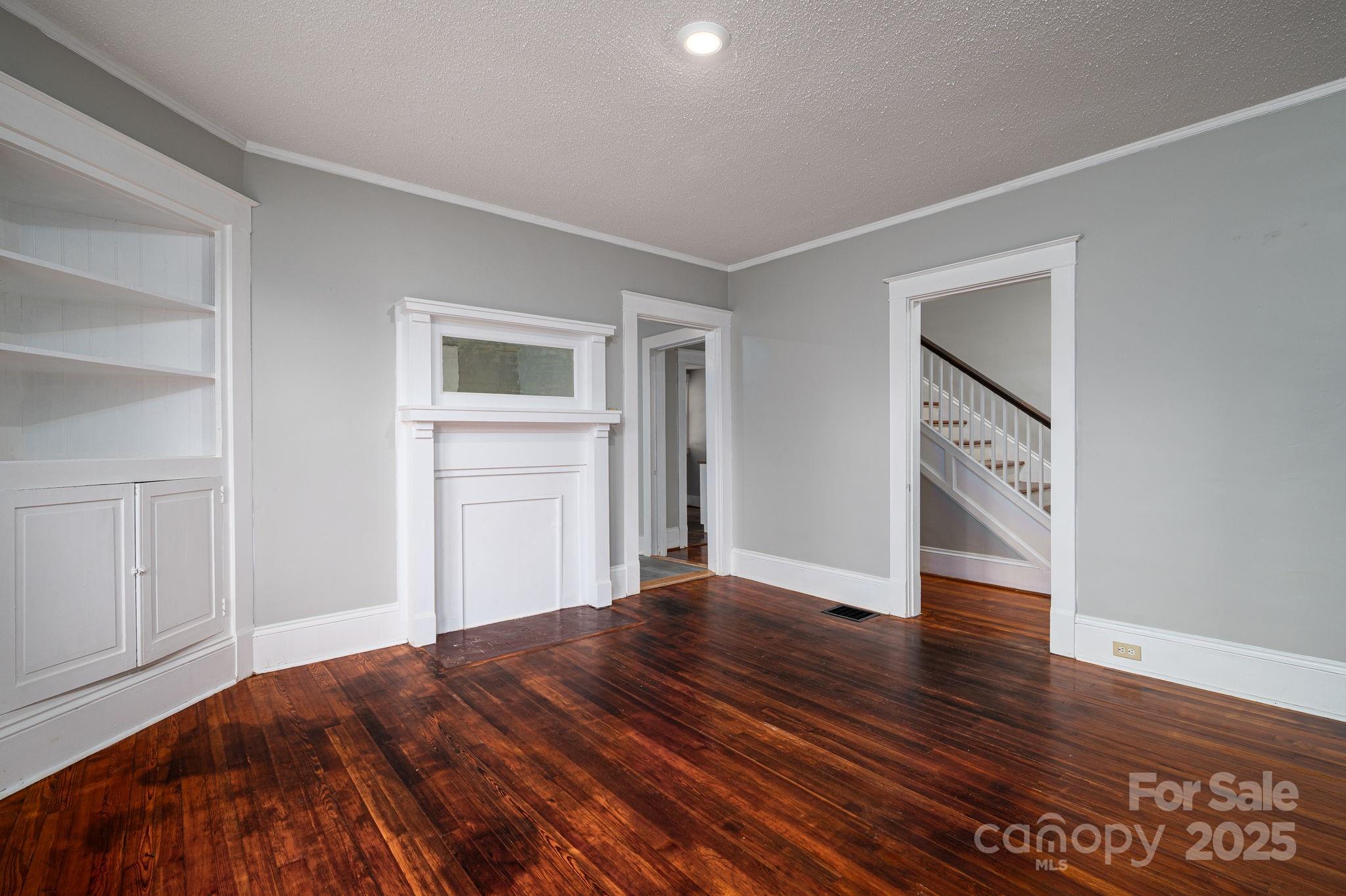 2645 Kool Park Road Northeast Hickory, NC 28601 - Photo 11 of 46 a view of a livingroom with wooden floor