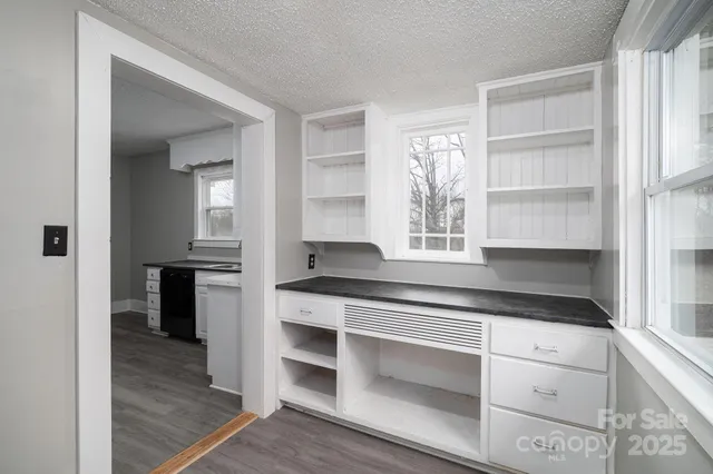 a bathroom with a double vanity sink and a bathtub