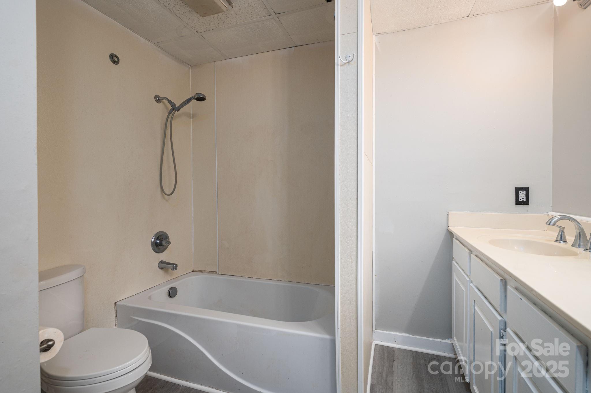 2645 Kool Park Road Northeast Hickory, NC 28601 - Photo 18 of 46 a bathroom with a sink a toilet and shower