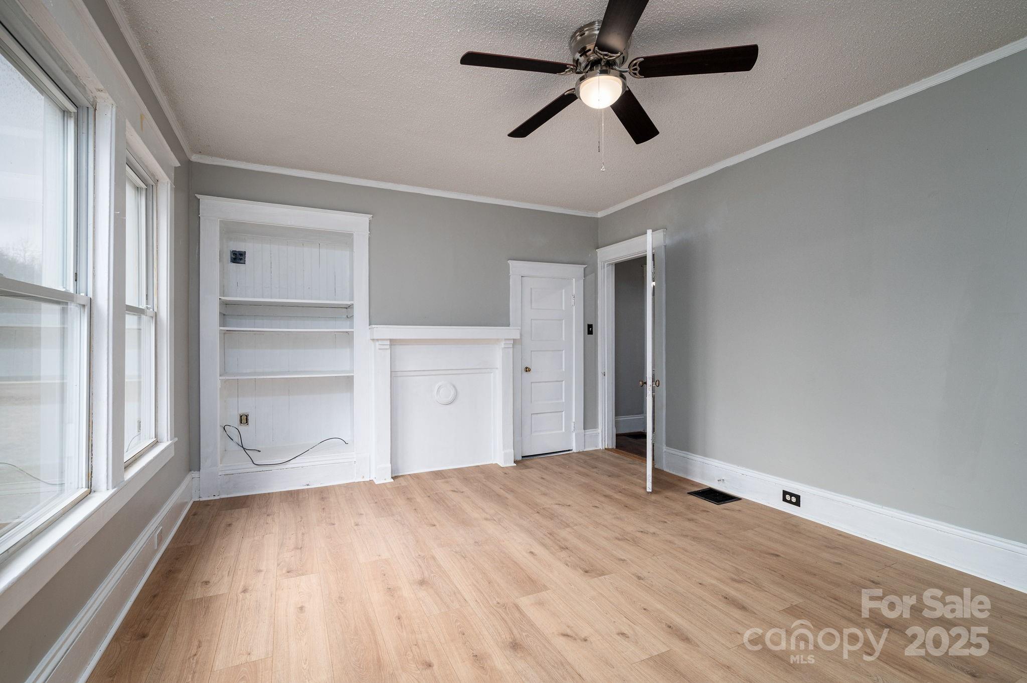 2645 Kool Park Road Northeast Hickory, NC 28601 - Photo 20 of 46 wooden floor in an empty room with a window