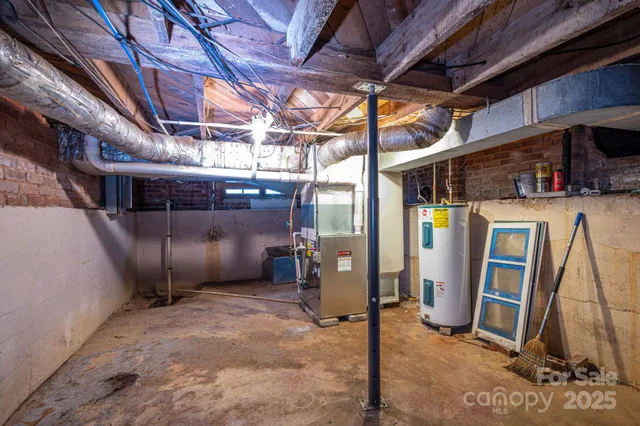 a view of a house with a yard and garage